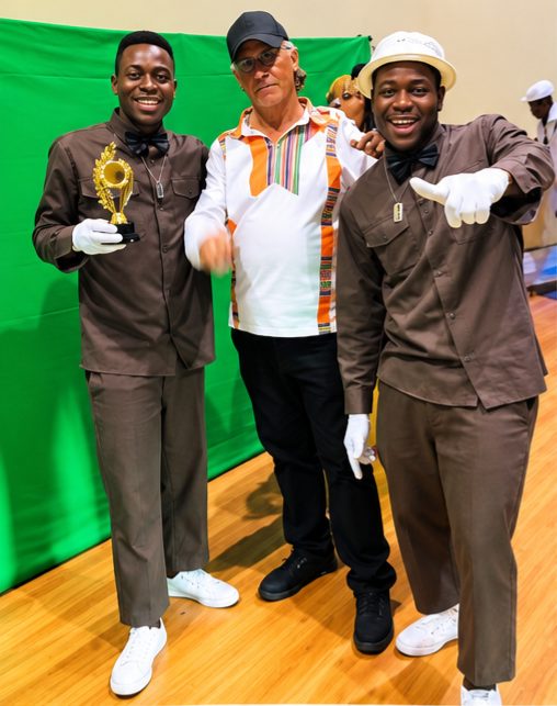Programme participants celebrating with an award