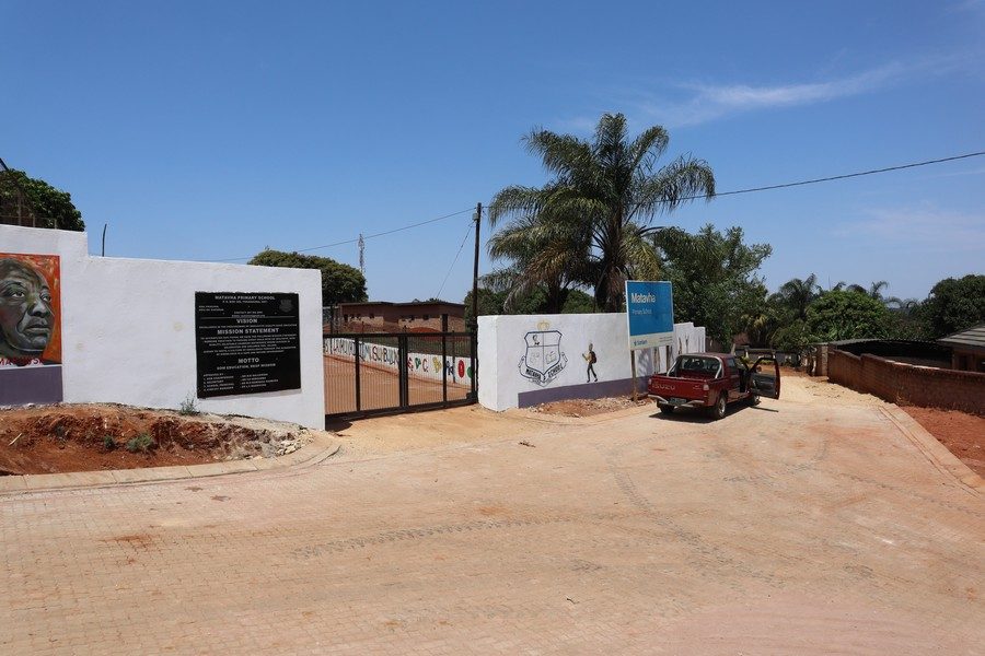 Community building and painted wall